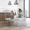 Clear acrylic dining table with chairs in a nice apartment.