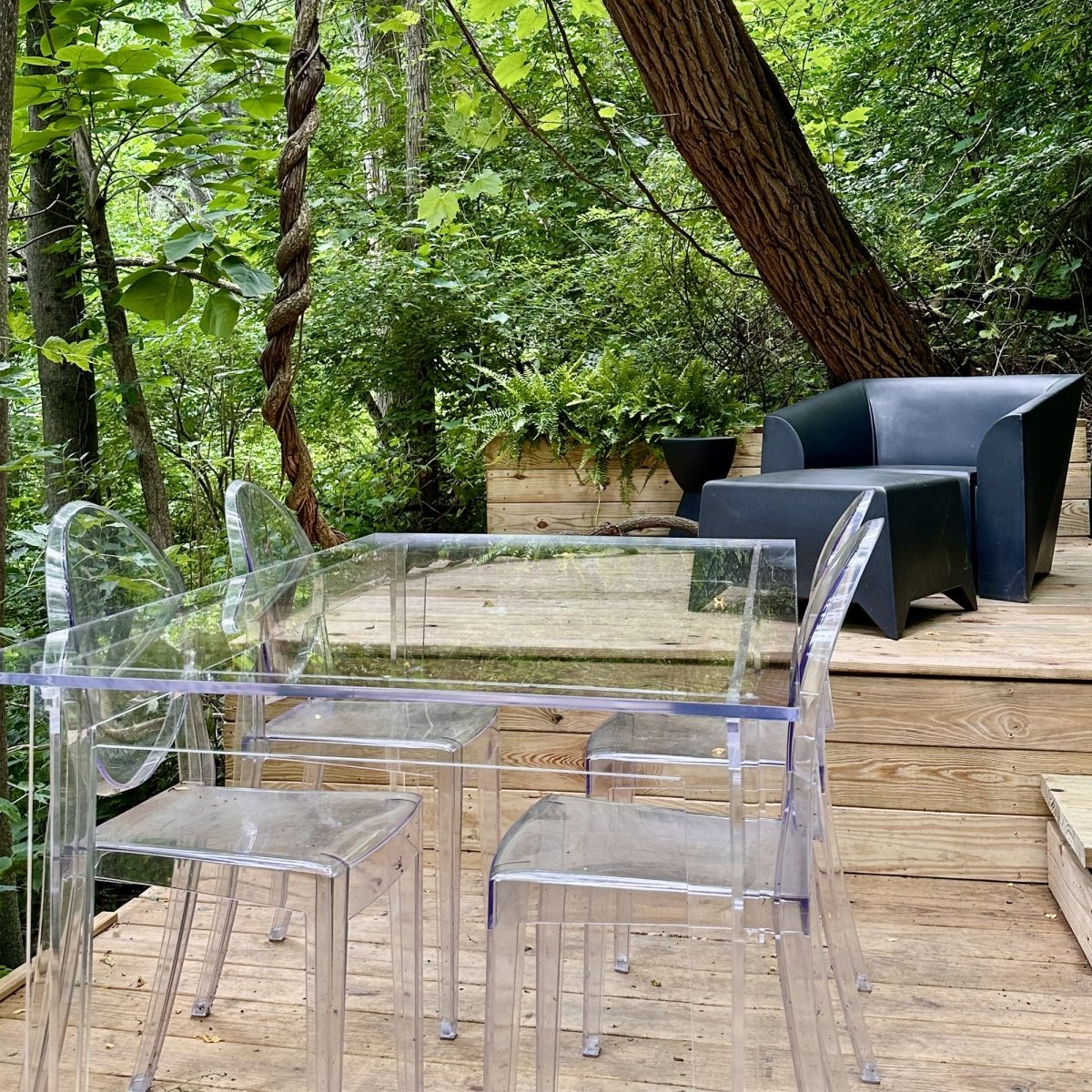 Clear acrylic table in a backyard.