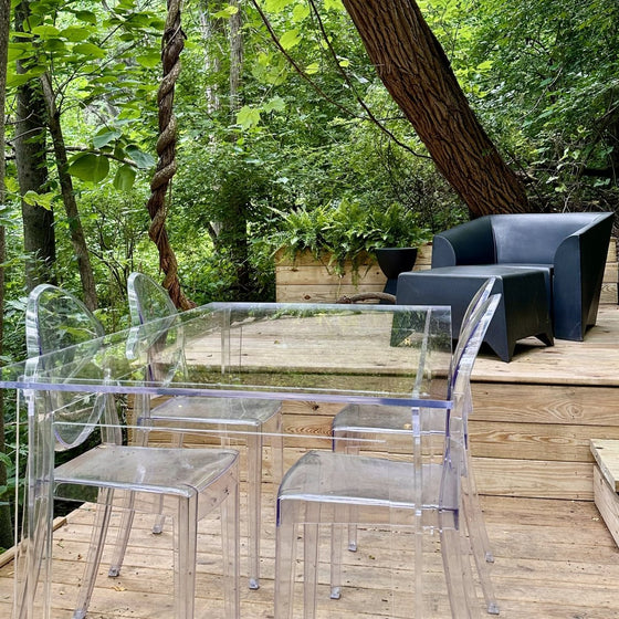 Clear acrylic table in a backyard.